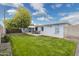 Spacious backyard with a patio area, perfect for outdoor entertaining and relaxation at 4907 E Piccadilly Rd, Phoenix, AZ 85018
