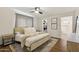 Cozy bedroom including a bed, nightstand, walk-in closet, and bathroom at 4907 E Piccadilly Rd, Phoenix, AZ 85018