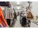 Walk-in closet with clothing racks and shelves for ample storage space at 4907 E Piccadilly Rd, Phoenix, AZ 85018