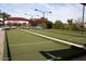 Bocce ball court with shaded seating areas and meticulously maintained turf at 4932 S Verbena Ave, Gilbert, AZ 85298