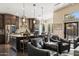 Spacious kitchen with an island, pendant lights, and stainless-steel appliances at 4932 S Verbena Ave, Gilbert, AZ 85298
