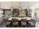 Modern kitchen with stainless steel appliances, lots of lighting, and granite countertops at 4932 S Verbena Ave, Gilbert, AZ 85298