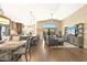 Open concept kitchen, dining and living room combination with great natural light at 4932 S Verbena Ave, Gilbert, AZ 85298