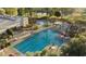 Aerial view of pool with lap lanes and relaxing lounge chairs at 4932 S Verbena Ave, Gilbert, AZ 85298