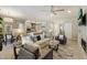 Open-concept living area with modern furnishings, fireplace, and seamless flow into the kitchen at 5250 E Deer Valley Dr # 206, Phoenix, AZ 85054