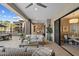 Expansive patio with comfortable seating, outdoor dining area, and built-in grill at 5250 E Deer Valley Dr # 206, Phoenix, AZ 85054