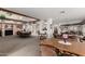 Open community room featuring neutral carpeting, exposed beams, and lots of seating at 5518 E Lindstrom Ln # 3012, Mesa, AZ 85215