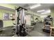 Well-equipped exercise room with weight machines, treadmill, and various fitness equipment at 5518 E Lindstrom Ln # 3012, Mesa, AZ 85215