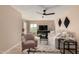 Comfortable living room with a plush rug, modern furniture and outdoor access at 5518 E Lindstrom Ln # 3012, Mesa, AZ 85215