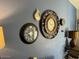 Wall decor features a collection of decorative wall clocks at 637 E Kramer St, Mesa, AZ 85203