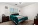 Bright bedroom with large windows and closet offering a relaxing space at 7359 W Kings Ave, Peoria, AZ 85382