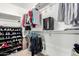 Spacious walk-in closet providing ample storage with shelving and hanging space at 7359 W Kings Ave, Peoria, AZ 85382