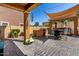 Backyard patio with built in barbecue ideal for outdoor entertainment at 7359 W Kings Ave, Peoria, AZ 85382