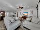Inviting living room with recessed lighting, ceiling fan and stylish furniture at 77 E Atole Ct, Queen Creek, AZ 85140