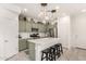 Stylish kitchen with stainless appliances, quartz countertops and an island at 8336 E Idaho Ave, Mesa, AZ 85209