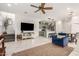 Open floor plan with modern furniture and tile flooring at 8336 E Idaho Ave, Mesa, AZ 85209