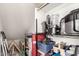 A storage room with shelves holding various household and kitchen items, maximizing space and organization at 8336 E Idaho Ave, Mesa, AZ 85209