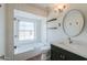 Well-lit bathroom featuring a glass shower and updated vanity with modern fixtures at 8379 E San Salvador Dr, Scottsdale, AZ 85258