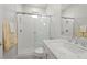 Modern bathroom with a glass-enclosed shower, white subway tile, and a stylish vanity with quartz countertops at 10778 N 137Th St, Scottsdale, AZ 85259