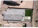 A bird's eye view showing the roof, patio, and backyard artificial turf at 13511 W Cassia Trl, Peoria, AZ 85383