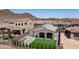 Aerial view of property shows a backyard with a patio, artificial grass, and BBQ area at 13511 W Cassia Trl, Peoria, AZ 85383