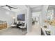 Bright hallway with a view of the living room and a neutral color palette at 13511 W Cassia Trl, Peoria, AZ 85383