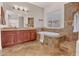 Bathroom showcasing a tub with tiled surround, step-in shower and double vanity at 1608 W Calle De Pompas --, Phoenix, AZ 85085