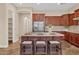 Beautiful kitchen featuring a center island with seating, granite countertops, and stainless steel appliances at 1608 W Calle De Pompas --, Phoenix, AZ 85085