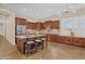 Gourmet kitchen with an island, granite countertops, stainless steel appliances, and custom cabinetry at 1608 W Calle De Pompas --, Phoenix, AZ 85085