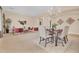 Cozy living and dining room with a seamless layout, stylish decor, and ample natural light at 1608 W Calle De Pompas --, Phoenix, AZ 85085