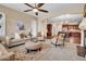 An open-concept layout connects the living area, kitchen, and dining space for easy living at 1608 W Calle De Pompas --, Phoenix, AZ 85085