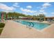 Inviting community pool surrounded by lounge chairs and umbrellas for comfortable relaxation at 1608 W Calle De Pompas --, Phoenix, AZ 85085