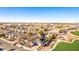 Features an elevated view of a residential neighborhood with desert landscaping and mountain views in the background at 17704 W Tasha Dr, Surprise, AZ 85388