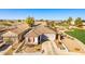 Beautiful home with solar panels, a two-car garage, and a white picket fence in a friendly neighborhood at 17704 W Tasha Dr, Surprise, AZ 85388