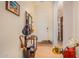 Inviting foyer with tile flooring, coat rack, and decorative accents that gives a welcoming feel at 17704 W Tasha Dr, Surprise, AZ 85388