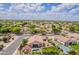 High-angle aerial showcases a property featuring a refreshing pool, well-manicured yard, and inviting outdoor spaces at 1919 S Granite St, Gilbert, AZ 85295
