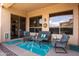 Inviting covered patio with outdoor seating, great for relaxing and entertaining at 1919 S Granite St, Gilbert, AZ 85295