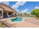 Refreshing pool and spa surrounded by lush landscaping, ideal for relaxation and outdoor enjoyment at 1919 S Granite St, Gilbert, AZ 85295