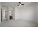 Bright bedroom featuring a ceiling fan and carpet flooring at 20775 W Rattler Rd, Buckeye, AZ 85396