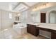 This spacious bathroom boasts dual vanities, a large soaking tub, and a stylish tile floor at 2270 E Honeysuckle Pl, Chandler, AZ 85249