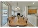 Dining room featuring an open floor plan, natural lighting, and tile flooring at 2600 E Springfield Pl # 58, Chandler, AZ 85286