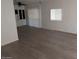 Open living area with durable flooring, built in cabinetry, and ample natural light at 2630 E Beverly Ln, Phoenix, AZ 85032