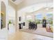 Spacious dining area showcasing the open floor plan with views into the living room and den at 28942 N Lazurite Way, San Tan Valley, AZ 85143
