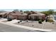 Well-kept single-Gathering home featuring desert landscaping, a tile roof, and a two-car garage at 28942 N Lazurite Way, San Tan Valley, AZ 85143