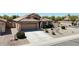 Charming single-story home featuring a desert-landscaped front yard and a two-car garage at 28942 N Lazurite Way, San Tan Valley, AZ 85143