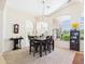Bright dining area showcasing the home's open floor plan, windows and adjacent living spaces at 28942 N Lazurite Way, San Tan Valley, AZ 85143