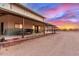 Beautiful barn with extended patio and outdoor seating, perfect for relaxing and entertaining at 29756 N Varnum Rd, San Tan Valley, AZ 85143