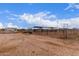 View of the horse arena showcasing its size and potential for equestrian activities and training at 29756 N Varnum Rd, San Tan Valley, AZ 85143