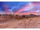 Spacious horse corrals with sturdy fencing, ideal for keeping animals safe and secure at 29756 N Varnum Rd, San Tan Valley, AZ 85143