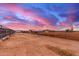 Outdoor horse property with horse in corral at twilight, showcasing rural or equestrian living at 29756 N Varnum Rd, San Tan Valley, AZ 85143